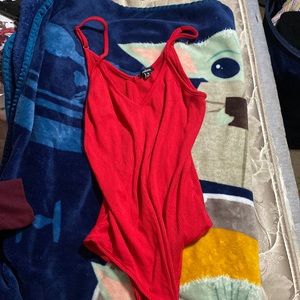 Red body suit